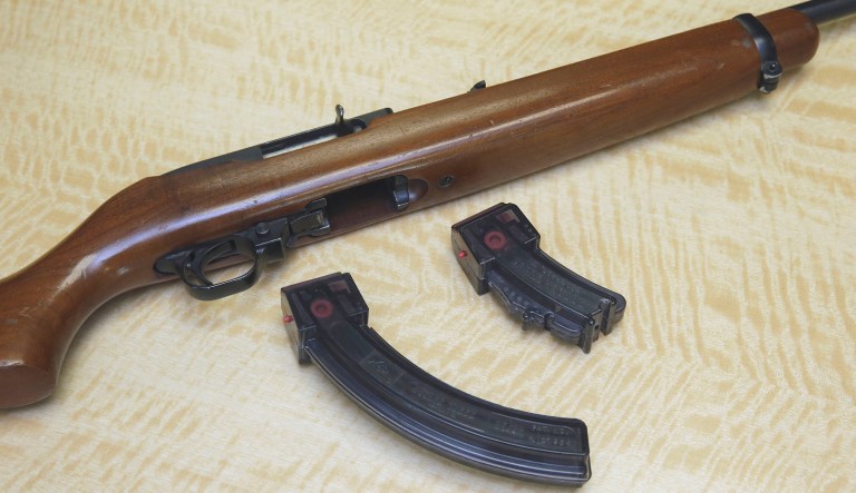 FILE - In this June 27, 2017 photo, a semi-automatic rifle is displayed with a 25 shot magazine, left, and a 10 shot magazine, right, at a gun store in Elk Grove, Calif. A federal judge on Friday, April 5, 2019, halted sales of high-capacity ammunition magazines in California, giving state officials a chance to appeal his order last week that allowed their sale for the first time in nearly 20 years. U.S. District Judge Roger Benitez barred further sales until the 9th U.S. Circuit Court of Appeals considers whether to reinstate the state's ban on magazines holding more than 10 bullets. 
