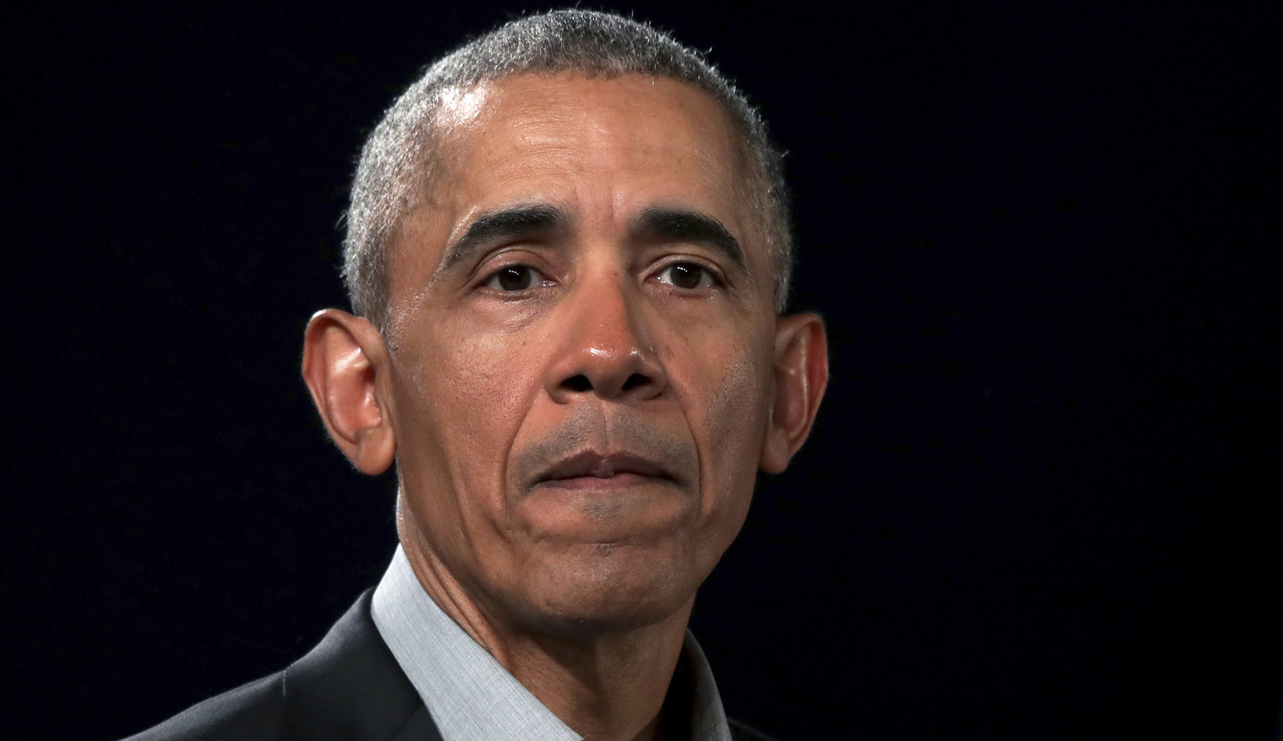 Obama takes veiled jabs at Trump in statement about shootings