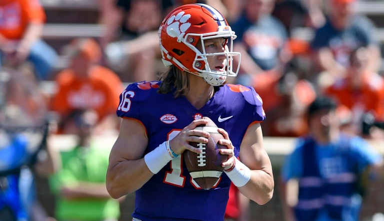 Clemson's Trevor Lawrence drops back to pass during Clemson's annual Orange and White NCAA college football spring scrimmage Saturday, April 6, 2019, in Clemson, S.C. 