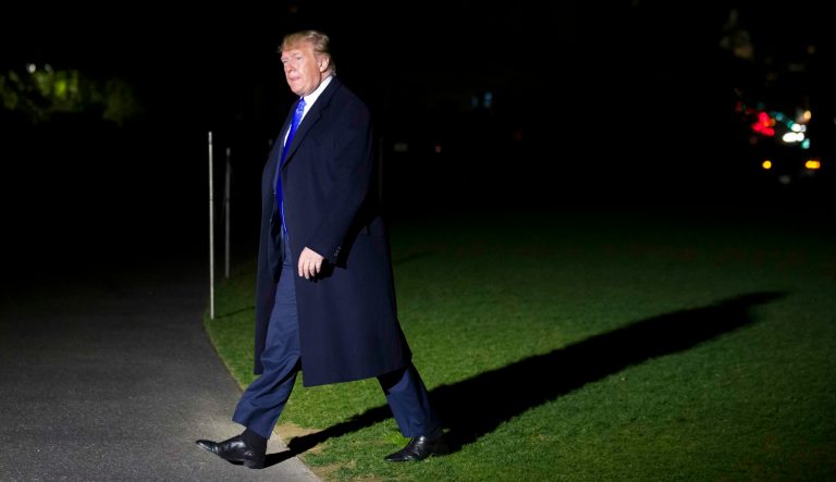 President Donald Trump walks after stepping off Marine One on the South Lawn of the White House, Saturday, April 6, 2019, in Washington. 