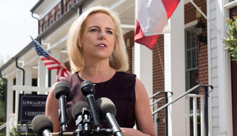 Homeland Security Secretary Kirstjen Nielsen talks outside her home in Alexandria, Va.