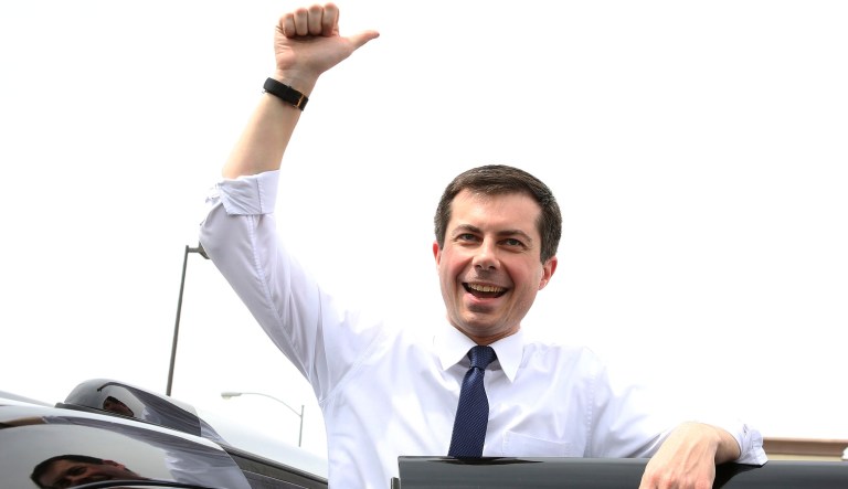 South Bend, Ind. Mayor Pete Buttigieg flashes a thumbs-up as he prepares to depart after speaking at a meet and greet event at MadHouse Coffee on Monday, April 8, 2019, in Las Vegas.