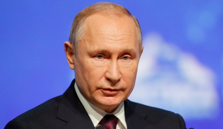 Russian President Vladimir Putin delivers his speech during the International Arctic Forum in St. Petersburg, Russia, Tuesday, April 9, 2019. 