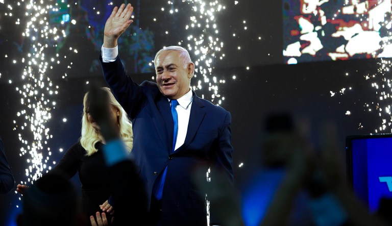 Israel's Prime Minister Benjamin Netanyahu waves to his supporters after polls for Israel's general elections closed in Tel Aviv, Israel, Wednesday, April 10, 2019. 