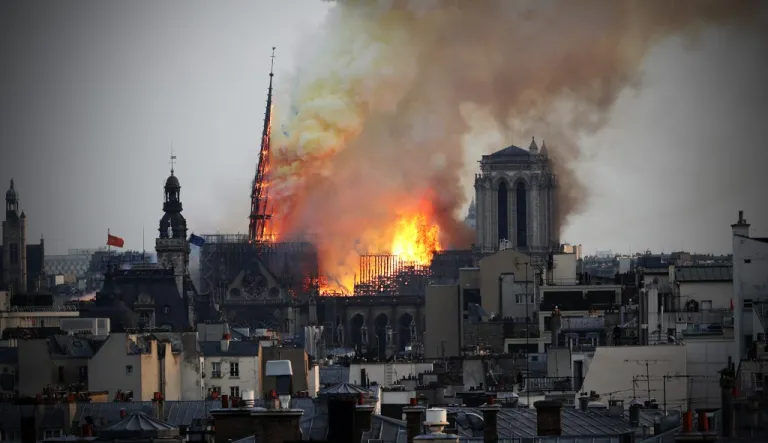 Flames rise from Notre Dame cathedral.