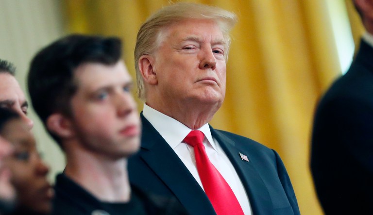 President Donald Trump stands during a Wounded Warrior Project Soldier Ride event in the East Room of the White House, Thursday, April 18, 2019, in Washington.
