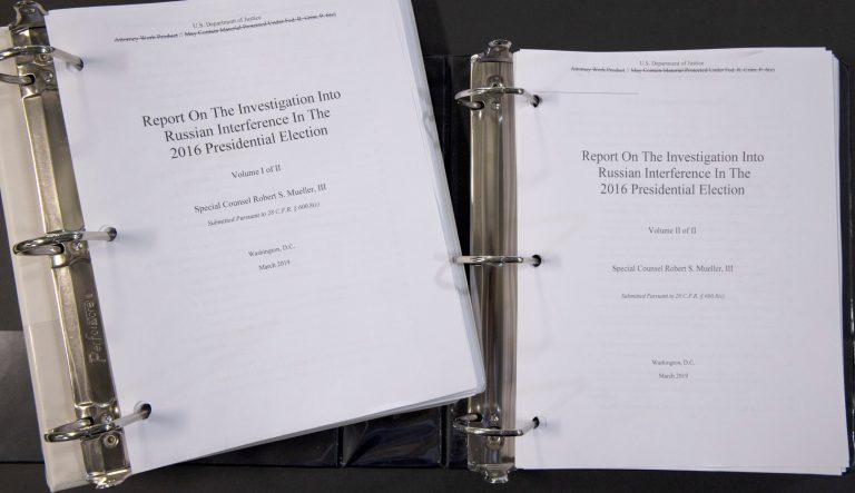 Special counsel Robert Mueller's redacted report on the investigation into Russian interference in the 2016 presidential election is photographed Thursday, April 18, 2019, in Washington. The report contained two volumes. 