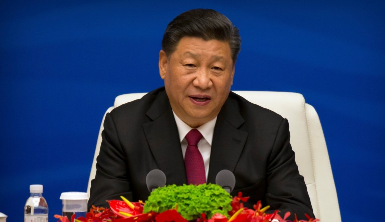Chinese President Xi Jinping speaks during an event to commemorate the 70th anniversary of the Chinese People's Liberation Army (PLA) Navy in Qingdao, China.