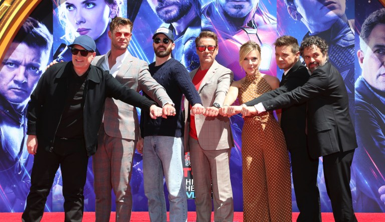 Marvel Studios President Kevin Feige, from left, poses with members of the cast of "Avengers: End Game," Chris Hemsworth, Chris Evans, Robert Downey Jr., Scarlett Johansson, Jeremy Renner and Mark Ruffalo at a hand and footprint ceremony at the TCL Chinese Theatre on Tuesday, April 23, 2019, in Los Angeles.