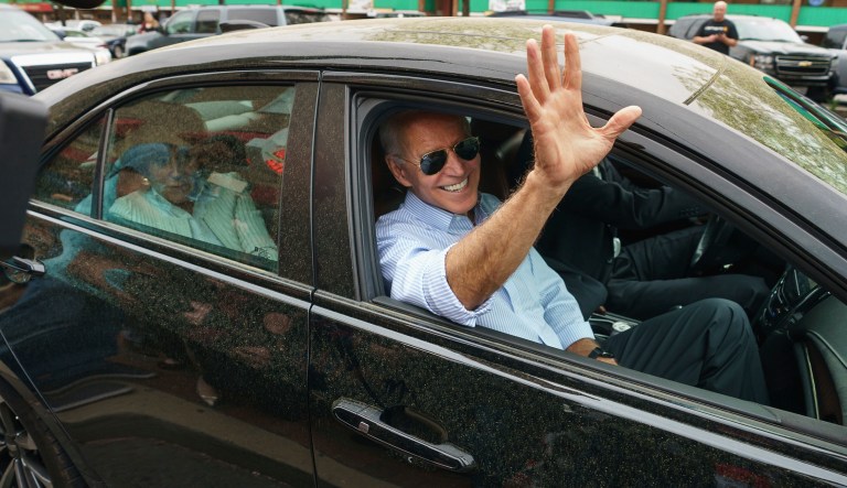Democratic presidential candidate and former Vice President Joe Biden waves goodbye after stopping at Gianni's Pizza, in Wilmington Del., Thursday, April 25, 2019.