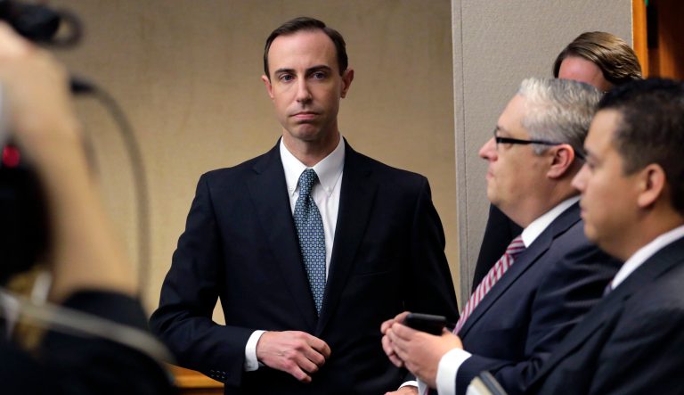 In this Feb. 7, 2019 photo, Secretary of State David Whitley, left, arrives for his confirmation hearing in Austin, Texas. Texas has settled a federal lawsuit over the state's bungled search for non-citizens among the state's 16 million registered voters. The agreement announced Friday, April 26, 2019 ends an effort by Texas elections officials that led to the state wrongly questioning the U.S. citizenship of tens of thousands of voters.