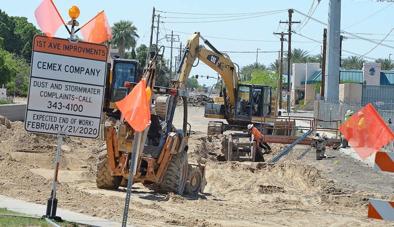 Construction crews with CEMEX Company work Friday on First Avenue between 16th Street and 13th Street. First Avenue is closed in all directions between 13th Street and 16th Street as part of the first phase of improvements to First Avenue between 16th Street and Orange Avenue, according to the city's road report. The project will include improvements to underground water and sewer infrastructure, upgrading sidewalks and some adjacent driveways, and improving surface pavement. Improvements at the intersection with 16th Street will include lane restrictions on 16th Street between May and September. The overall project time is expected to take eight months to complete. 