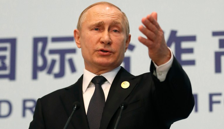 Russian President Vladimir Putin gestures while speaking to the the media after the Belt and Road Forum in Beijing, China, Saturday, April 27, 2019.