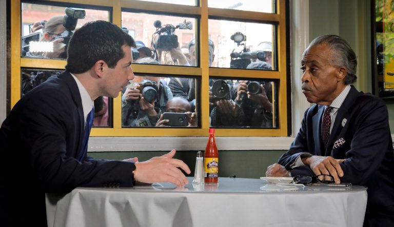 Democratic presidential candidate Mayor Pete Buttigieg, from South Bend, Indiana, and civil rights leader Rev. Al Sharpton, right, President of National Action Network, hold a lunch meeting at Sylvia's Restaurant in Harlem, New York, Monday, April 29, 2019. 