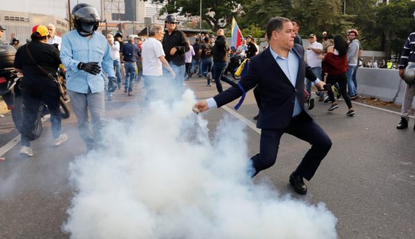 Gunfire in the Venezuelan streets may signal opposition victory