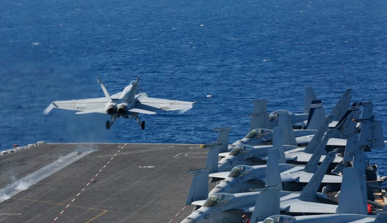 In this May 3, 2019 photo released by the U.S. Navy, An F/A-18E Super Hornet from VFA 25 launches from the flight deck of the Nimitz-class aircraft carrier USS Abraham Lincoln. The U.S. is dispatching the USS Abraham Lincoln and other military resources to the Middle East following "clear indications" that Iran and its proxy forces were preparing to possibly attack U.S. forces in the region, according to a defense official on May 5, 2019. 
