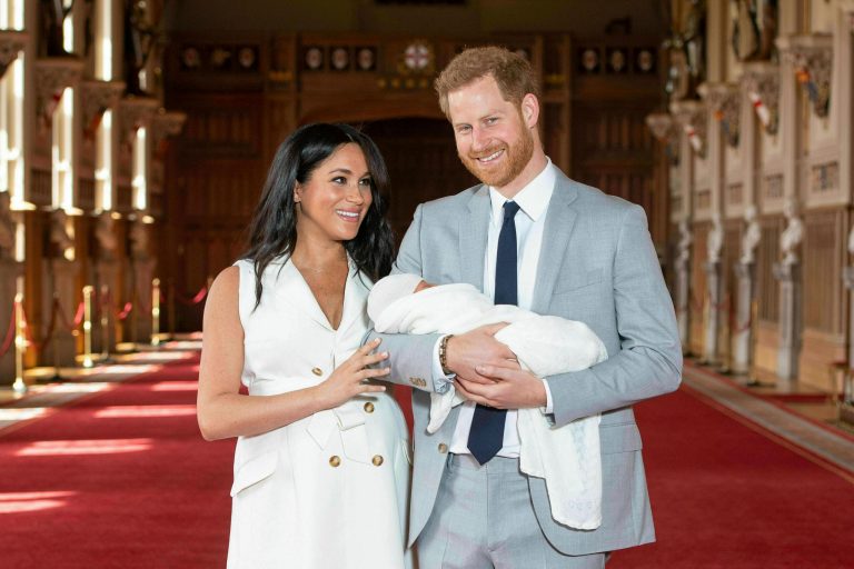 Britain's Prince Harry and Meghan, Duchess of Sussex, during a photocall with their newborn son, in St George's Hall at Windsor Castle, Windsor, south England, Wednesday May 8, 2019. 