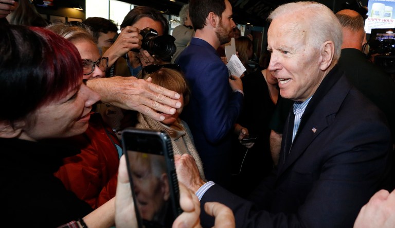 Former vice president and Democratic presidential candidate Joe Biden greets supporters during a campaign stop at the Community Oven restaurant in Hampton, N.H., Monday, May 13, 2019.