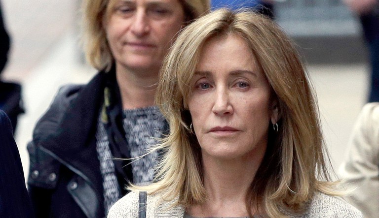 Felicity Huffman departs federal court.