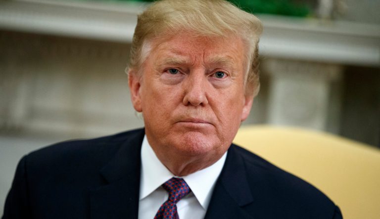 In this May 13, 2019, photo, President Donald Trump in the Oval Office of the White House in Washington. 