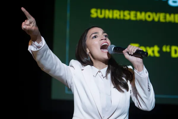 AOC and Bernie Sanders rally against ‘middle ground’ on Green New Deal