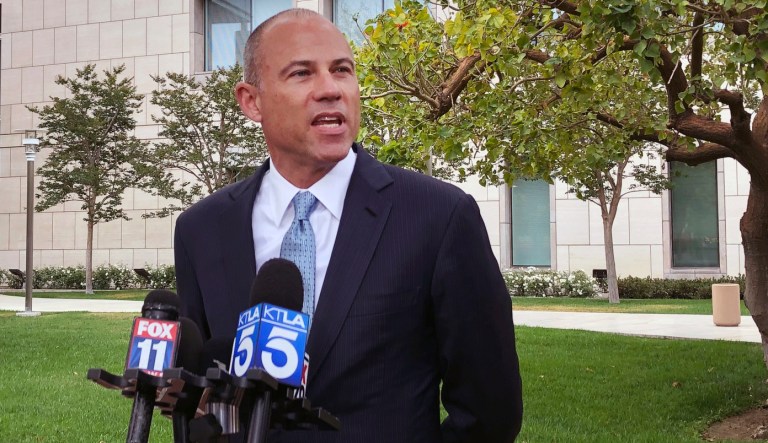 Attorney Michael Avenatti talks to the media outside of federal court in Santa Ana, Calif. on Wednesday, May 15, 2019. Avenatti has told a federal judge in California that he has hired a lawyer to represent him in a case alleging he stole millions of dollars from clients, cheated on taxes and committed bank fraud. 