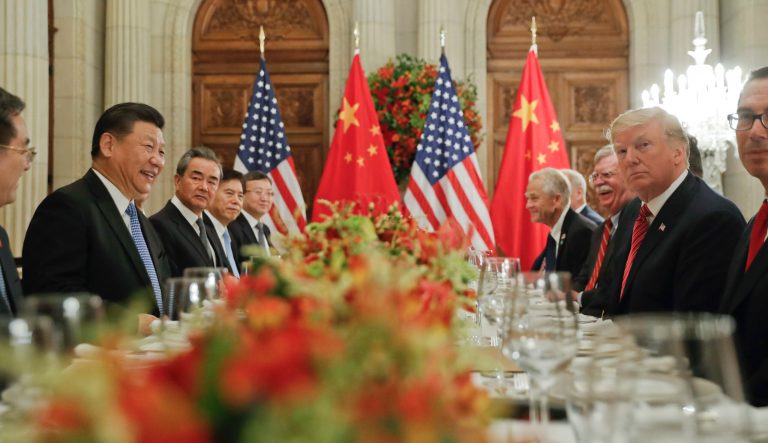 In this Dec. 1, 2018 photo, President Donald Trump, second from right, meets with China's President Xi Jinping, second from left, during their bilateral meeting at the G20 Summit, in Buenos Aires, Argentina. 