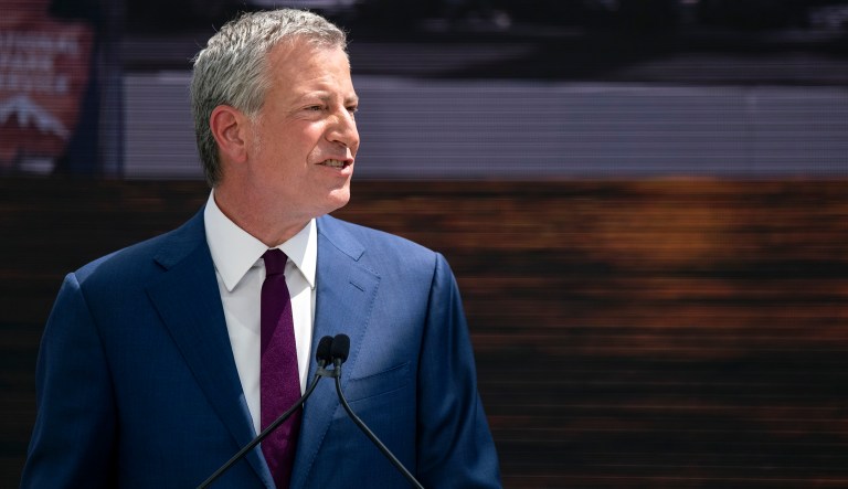 New York Mayor Bill de Blasio speaks during the official dedication ceremony of the Statue of Liberty Museum on Liberty Island Thursday, May 16, 2019, in New York. De Blasio announced Thursday that he will seek the Democratic nomination for president, adding his name to an already long list of candidates itching for a chance to take on Donald Trump.