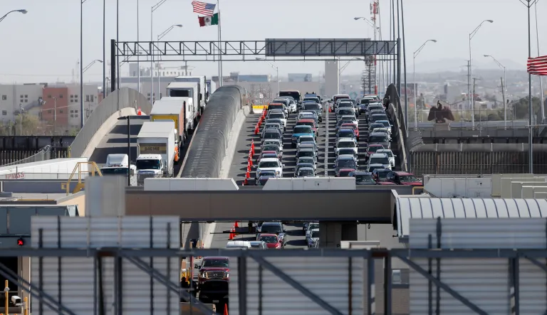 In this March 29, 2019 file photo, cars and trucks line up to enter the U.S. from Mexico at a border crossing in El Paso, Texas.