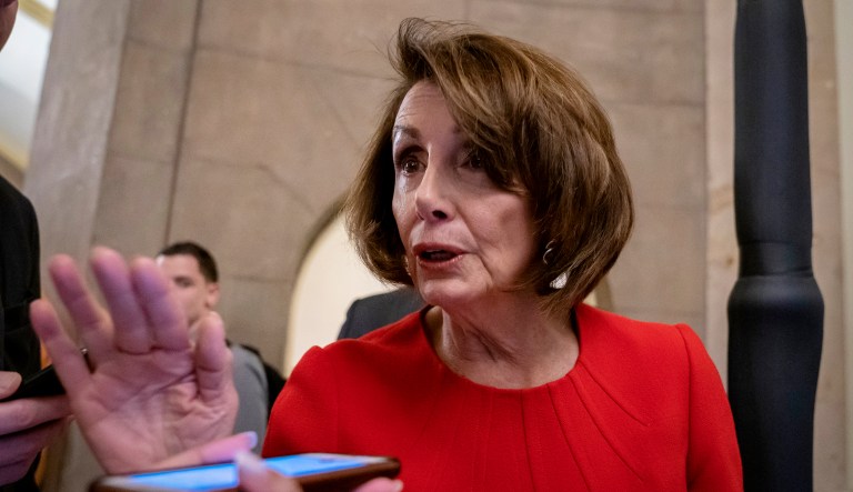 Speaker of the House Nancy Pelosi, D-Calif., talks to reporters as she leaves the chamber at the Capitol in D.C.