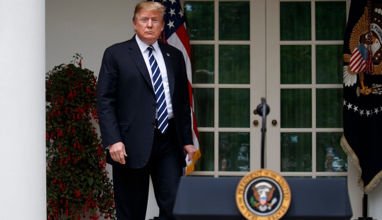 President Donald Trump arrives to deliver a statement in the Rose Garden of the White House, Wednesday, May 22, 2019, in Washington. 