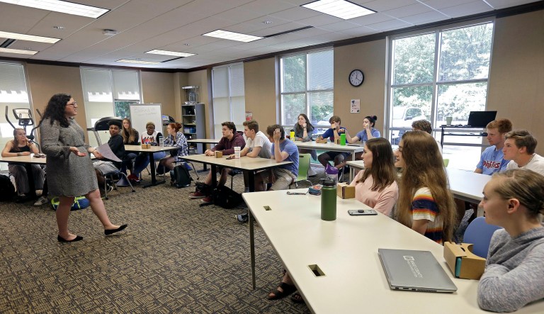 11th grade students learn about the D-Day invasion at Normandy from social sciences teacher Kasey Turcol during an advanced placement history class at Crossroads FLEX school in Cary, N.C.