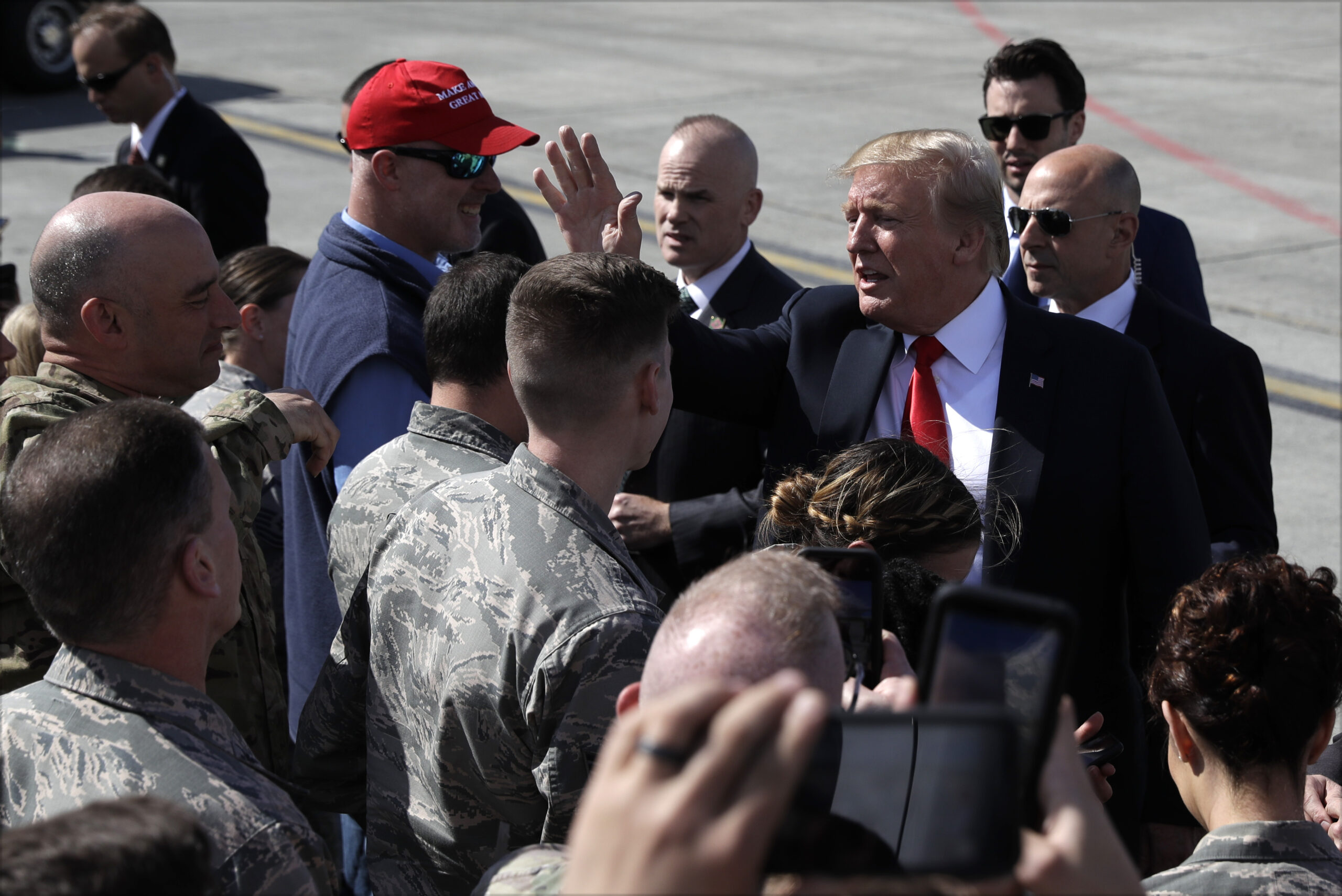 Trump greets military personnel in Alaska before heading to Tokyo