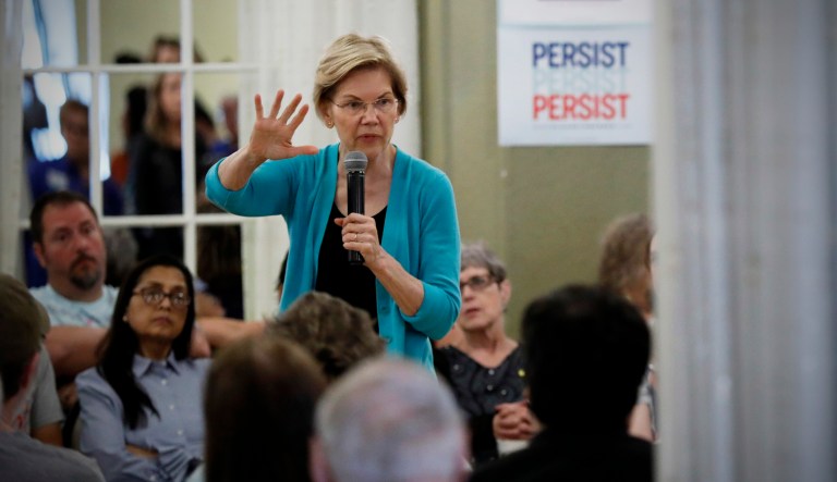 Democratic presidential candidate Sen. Elizabeth Warren speaks to local residents during a meet and greet in Ottumwa, Iowa.