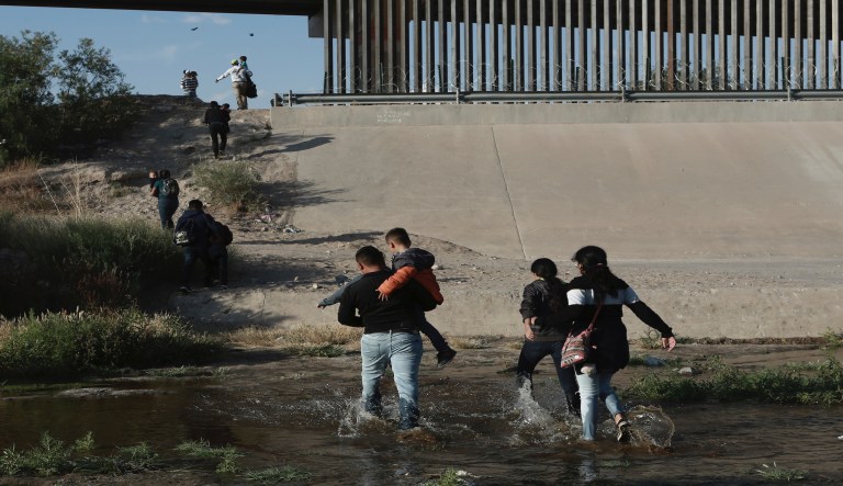Migrant families cross the Rio Grande to get illegally across the border into the United States, to turn themselves in to authorities and ask for asylum, next to the Paso del Norte international bridge, near El Paso, Texas, Friday, May 31, 2019. The Border Patrol said it has encountered more than 180 groups of over 100 people since October, compared with 13 in the previous 12-month period and two the year before. 