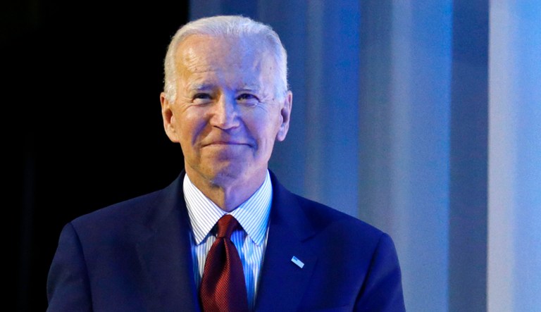 Democratic presidential candidate and former Vice President Joe Biden walks on stage.