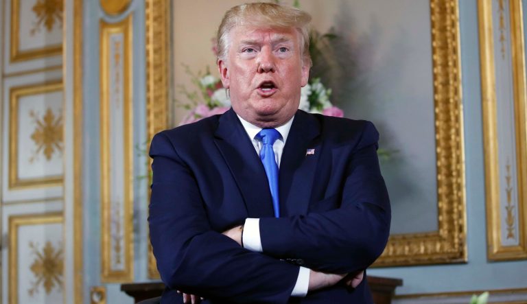 President Donald Trump meets with French President Emmanuel Macron in Caen, France, following a ceremony to commemorate the 75th anniversary of D-Day at The Normandy American Cemetery, Thursday, June 6, 2019, in Colleville-sur-Mer, Normandy, France. 