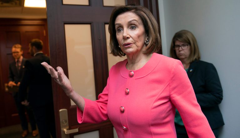Speaker of the House Nancy Pelosi, D-Calif., arrives for a closed-door meeting at the Capitol in Washington, Tuesday, June 11, 2019. 