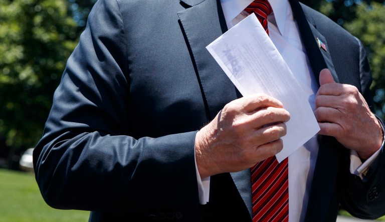 President Trump speaks to reporters.