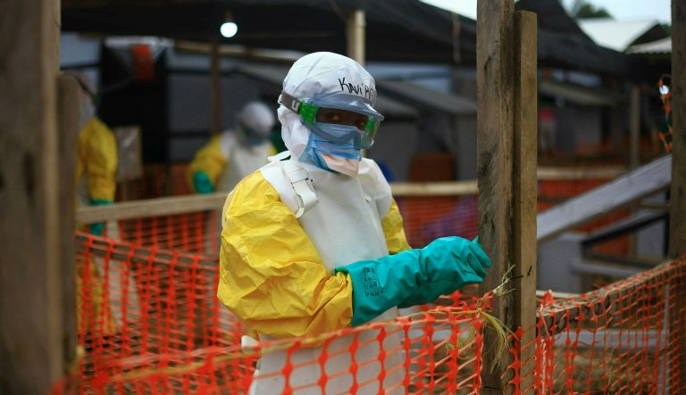 This Tuesday, April, 16, 2019 photo taken in Congo shows an Ebola health worker at a treatment center in Beni, Eastern Congo. Uganda's health ministry said late Tuesday, June 11, 2019 that a 5-year-old Congolese boy who crossed into Uganda has tested positive for Ebola in what is the first cross-border case of the deadly virus since an outbreak started in neighboring Congo last year. 