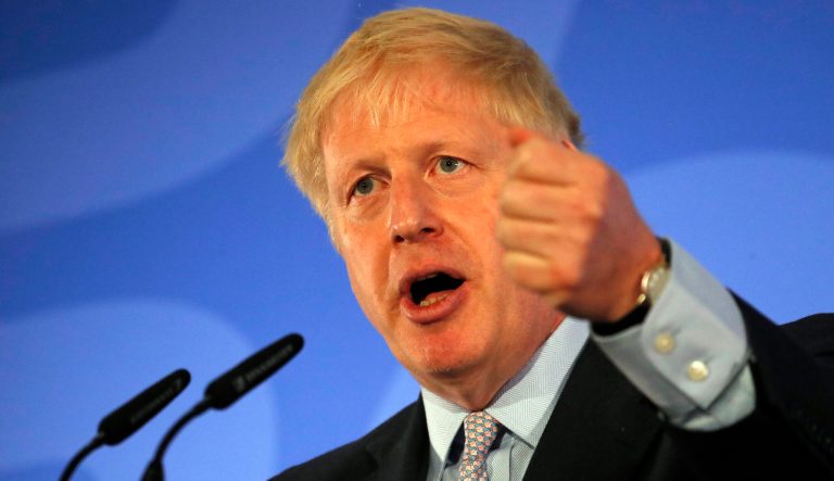 Britain's Conservative Party lawmaker Boris Johnson gestures as he speaks during the official launch of his leadership campaign, in London, Wednesday June 12, 2019. 