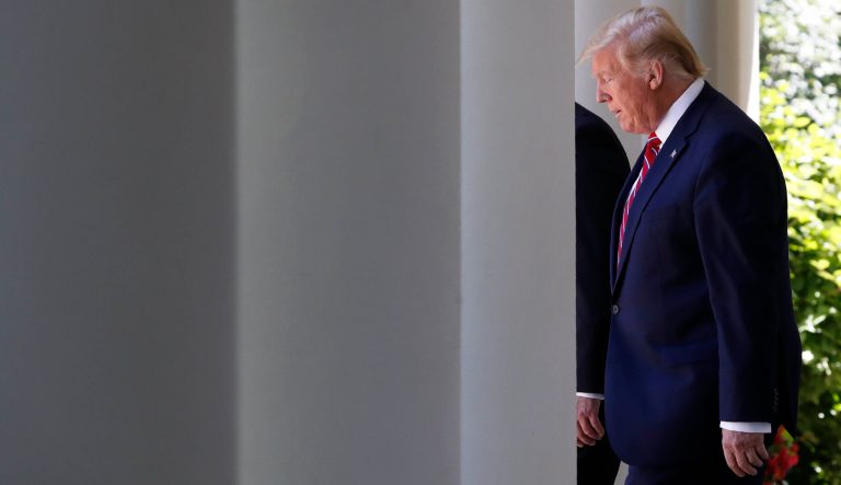 President Donald Trump walks through the Colonnade of the White House, next to Polish President Andrzej Duda, as they arrive for a news conference in the Rose Garden, Wednesday June 12, 2019, in Washington. 