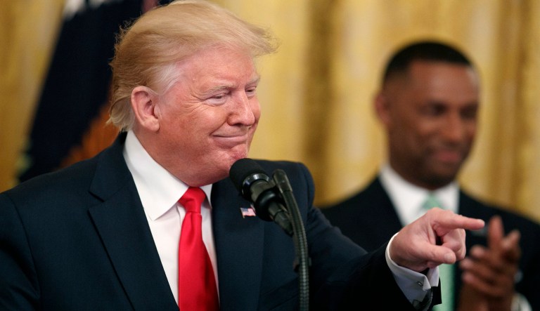 President Donald Trump gestures into the audience as he speaks about second chance hiring in the East Room of the White House, Thursday June 13, 2019, in Washington.