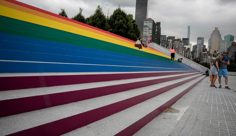 A monumental stair at the FDR Four Freedoms State Park is transformed into a giant, rainbow-hued LGBTQ flag in celebration of WorldPride, Monday, June 17, 2019, on Roosevelt Island in New York.