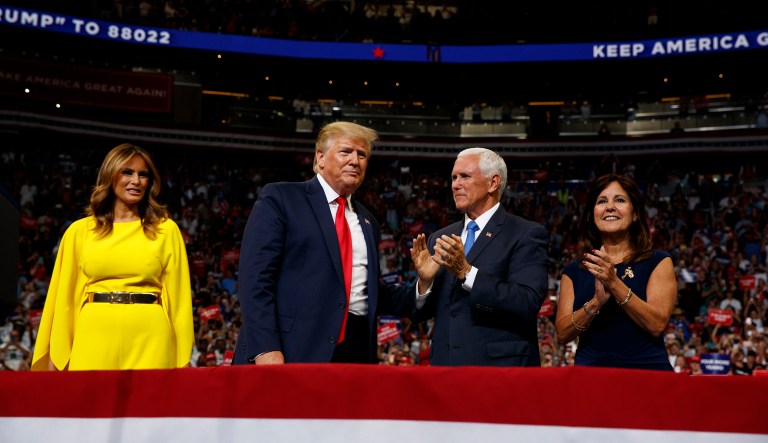 President Donald Trump and first lady Melania Trump stand with Vice President Mike Pence and Karen Pence during Trump's re-election kickoff rally at the Amway Center, Tuesday, June 18, 2019, in Orlando, Fla.