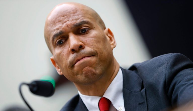 Democratic Presidential candidate Sen. Cory Booker, D-N.J., waits to testify about reparation for the descendants of slaves during a hearing before the House Judiciary Subcommittee on the Constitution, Civil Rights and Civil Liberties, at the Capitol in Washington, Wednesday, June 19, 2019. 
