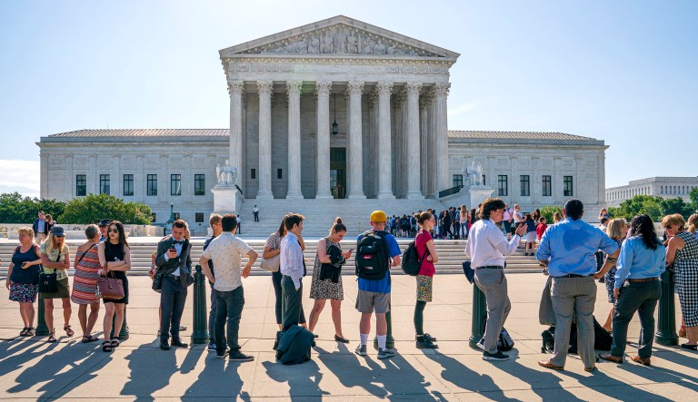 Visitors line up to enter the Supreme Court on Capitol Hill in Washington.