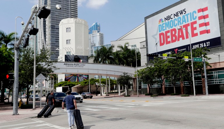 A billboard advertises the Democratic Presidential Debates across from the Knight Concert Hall at the Adrienne Arsht Center for the Performing Arts of Miami-Dade County in Miami.