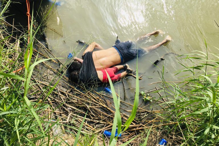 EDS NOTE: GRAPHIC CONTENT - The bodies of Salvadoran migrant Oscar Alberto MartÃ­nez RamÃ­rez and his nearly 2-year-old daughter Valeria lie on the bank of the Rio Grande in Matamoros, Mexico, Monday, June 24, 2019, after they drowned trying to cross the river to Brownsville, Texas. Martinez' wife, Tania told Mexican authorities she watched her husband and child disappear in the strong current. (AP Photo/Julia Le Duc)