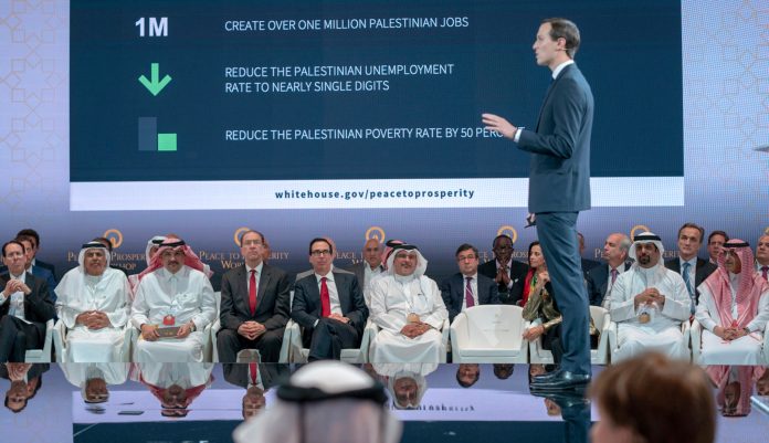 ap-19177236527269.jpg In this Tuesday, June 25, 2019, photo released by Bahrain News Agency, U.S. Treasury Secretary Steven Mnuchin, fifth from left, and Bahrain Crown Prince Salman bin Hamad Al Khalifa, sixth from left, listen to White House senior adviser Jared Kushner, standing, during the opening session of the "Peace to Prosperity" workshop in Manama, Bahrain.